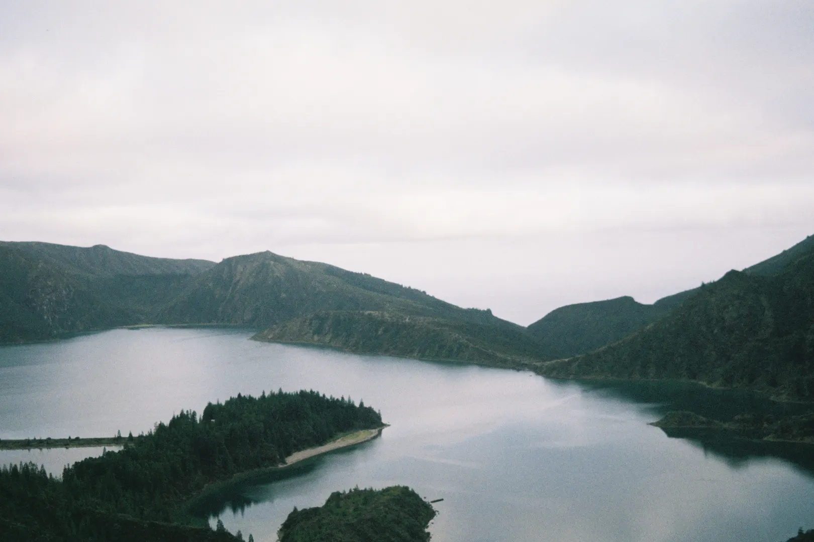 Lagoa do Fogo crater lake surrounded by green slopes on São Miguel