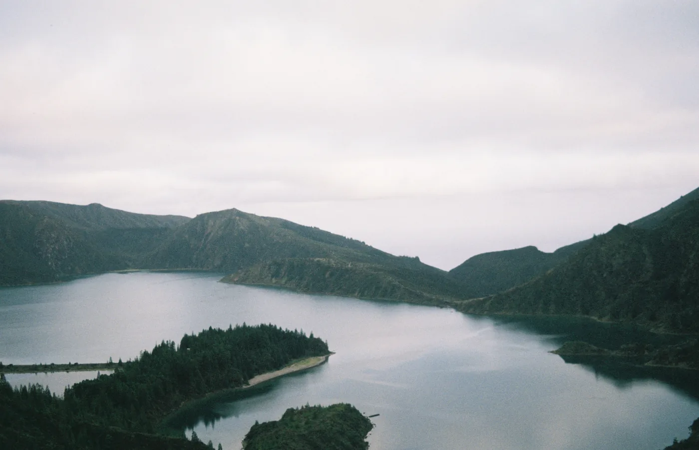 Lagoa do Fogo crater lake surrounded by green slopes on São Miguel